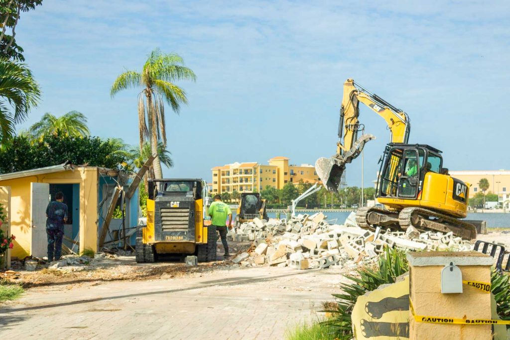 residential demolition treasure island excavator and skid steer