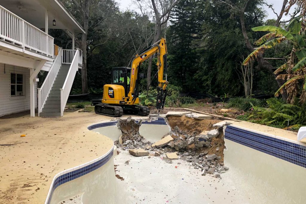 pool removal pool demolition excavator