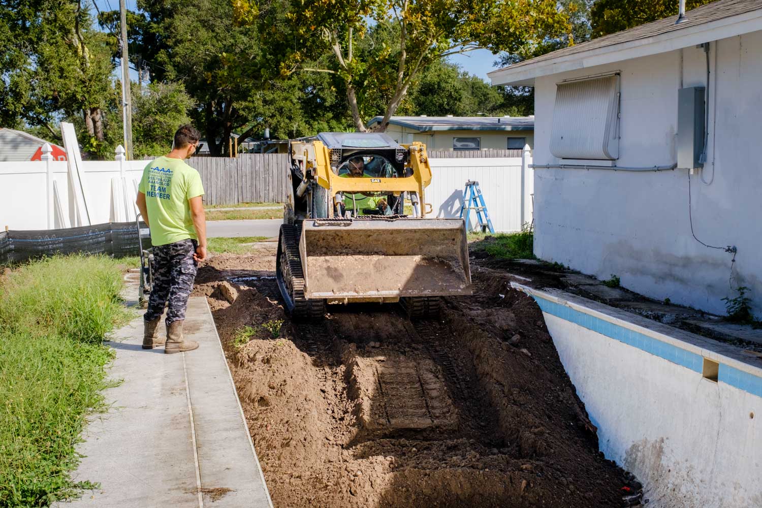 skid steer pool removal demolition